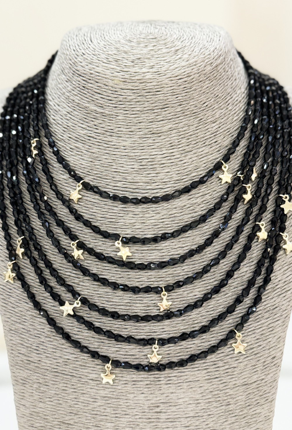 подвеска многорядная со звездами черная - фото 94348