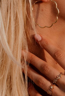 Gold ring with symbol Knot