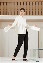 Брюки с бахромой - фото 108000