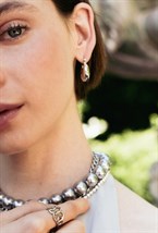 Earrings with a twisted seam - фото 123233