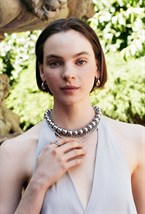 Earrings with a twisted seam - фото 123234