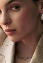 Earrings with a twisted seam - фото 123248