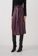 Юбка с бантом из экокожи - фото 89391